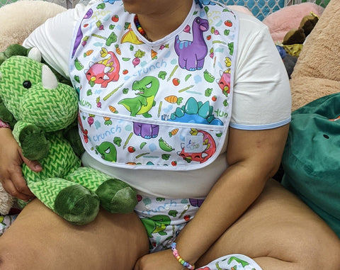 Veggisaurus Dinosaur Water Proof Bib with Pocket second image
